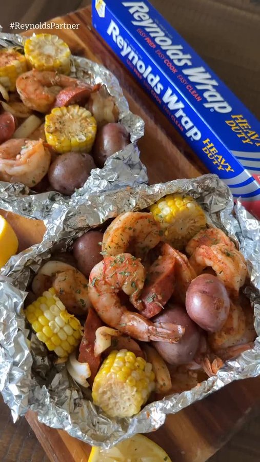 Instagram post by @britscookin for Reynolds Brands. Caption reads: Cajun Shrimp Foil Packs on the grill!....