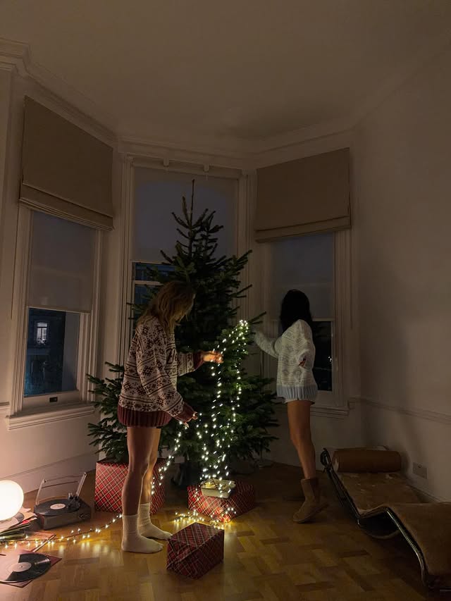 Instagram post by @lydsbutler for boandtee. Caption reads: keeping cosy in @boandtee christmas knits 🎄 ad.