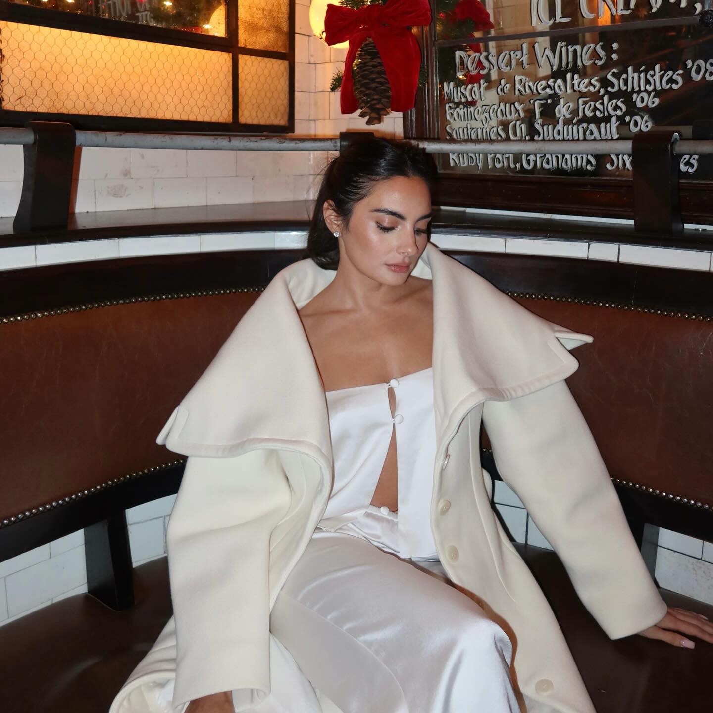 Instagram post by @paige_desorbo for American Express. Caption reads: #ad When your team crushes the year, you take them....