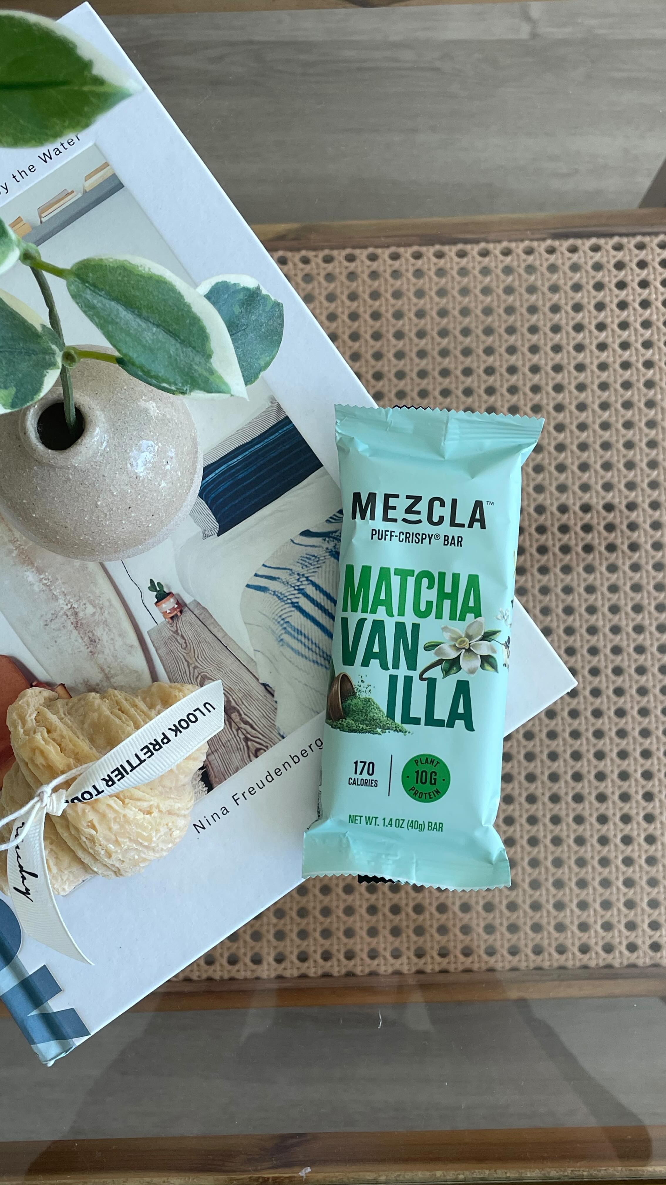 Instagram post by @livinwithiz for Mezcla. Caption reads: @eatmezcla is the perfect everyday snack -....
