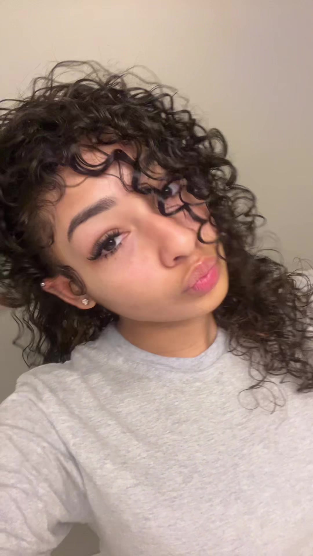 TikTok post by @imnot._nyla for Hairplexx Beauty. Caption reads: quick curly hair routine with @Hairplexx Beauty....