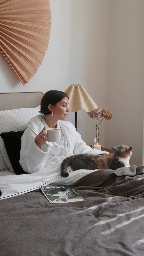 Instagram post by @thealiceedit for The White Company. Caption reads: Ad Sunday plans with @thewhitecompany 🐱🛌☕️.