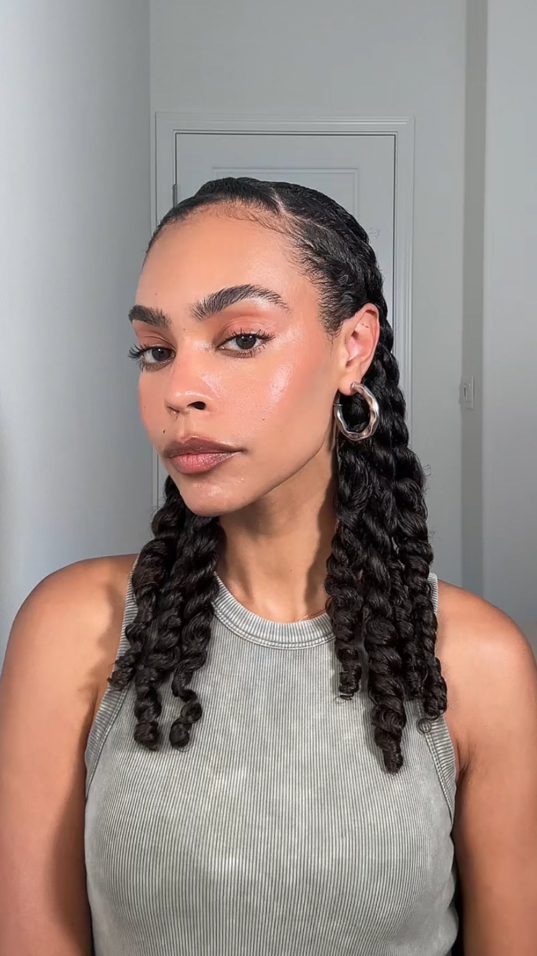 Instagram post by @tajapickett for Eva NYC. Caption reads: A frizz-free hair styling routine that I can’t....