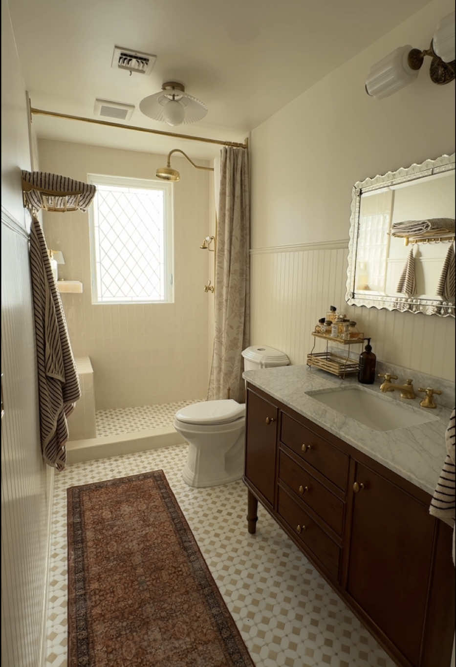 TikTok post by @mrsmckennabarry for Lowe's. Caption reads: Replying to @Toni Keywell My dream bathroom is....