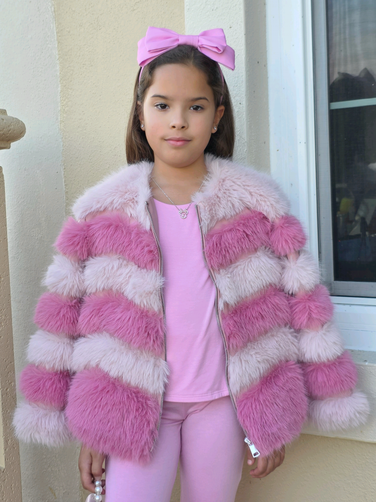 TikTok post by @kylie_feliz_ for Fashion Nova. Caption reads: @novakids by @Fashion Nova Cozy in pink 💕 🔍Mini....