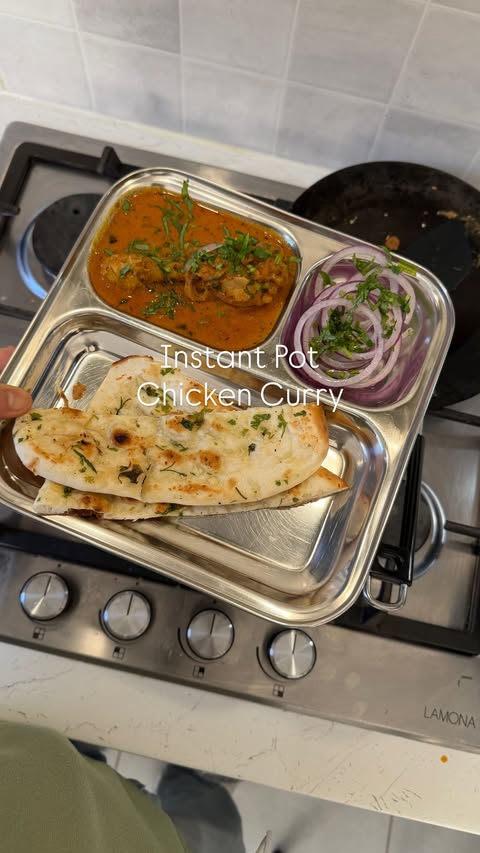 Instagram post by @chefneel.ns for Instant Pot. Caption reads: Instant Pot Chicken Curry 🍛 Detailed recipe in....