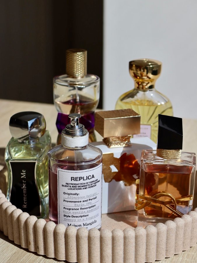 Instagram post by an influencer for Jovoy Parfums. Caption reads: My quiet luxury perfume tray 🤫✨ Perfumes on tray:....