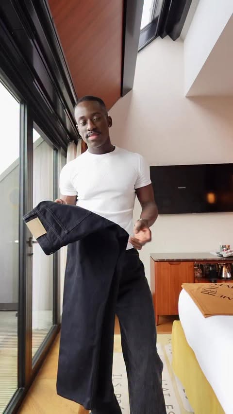 Instagram post by an influencer for Suitsupply. Caption reads: [...] just got tailored SS26 @suitsupply....