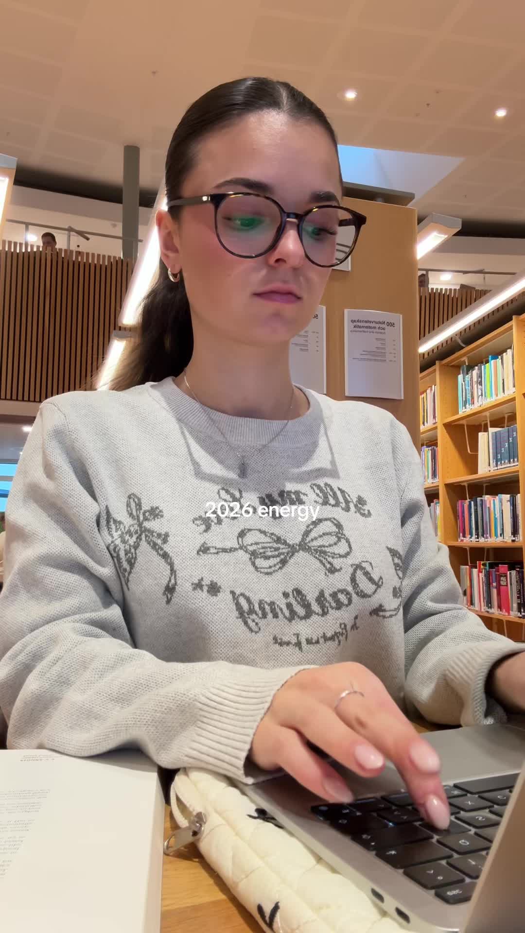 TikTok post by @eemlyy for In Print We Trust. Caption reads: [...] shirts and Notebook are from @In Print We....