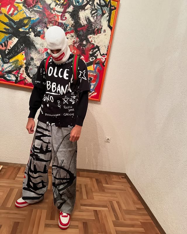 Instagram post by @lil_10age for Supreme. Caption reads: Dripped in high-fashion streetwear: Gucci, Dolce &....