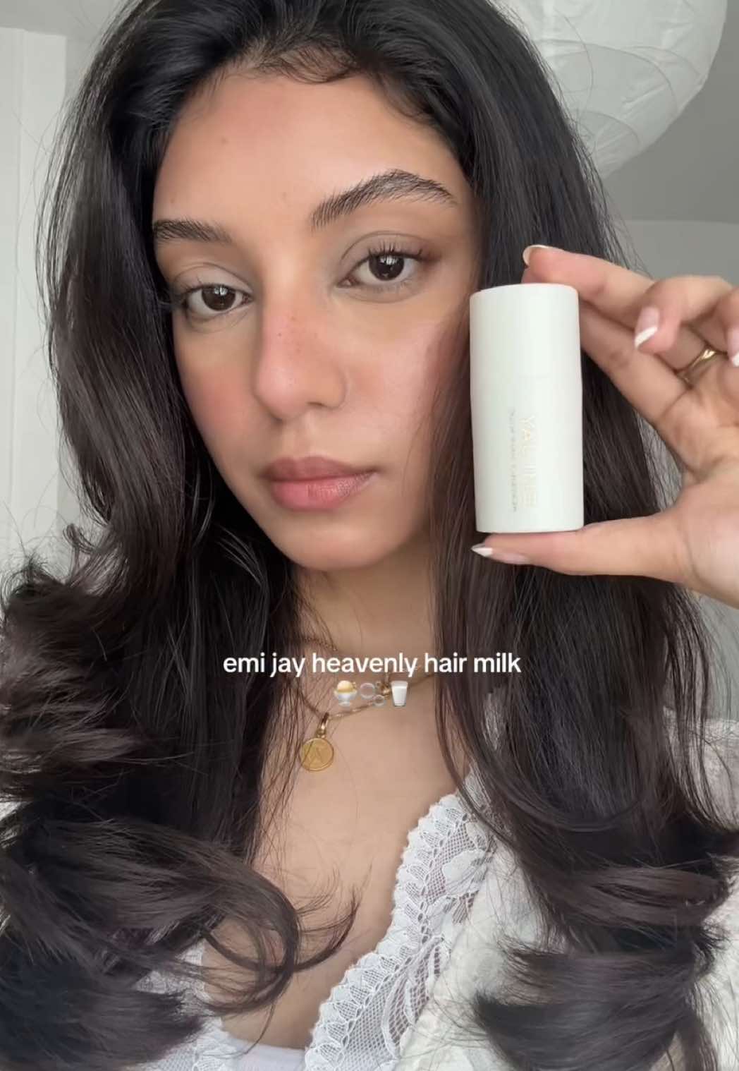 TikTok post by @028ze for Emi Jay. Caption reads: heavenly, dreamy hair🍨🥛🪽 with @Emi Jay’s new....