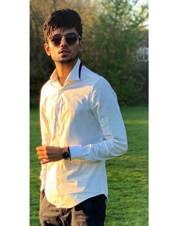 Instagram post by @gani_khann for SKAGEN. Caption reads: The time @skagendenmark 💯❤️ - When d Sun ☀️....