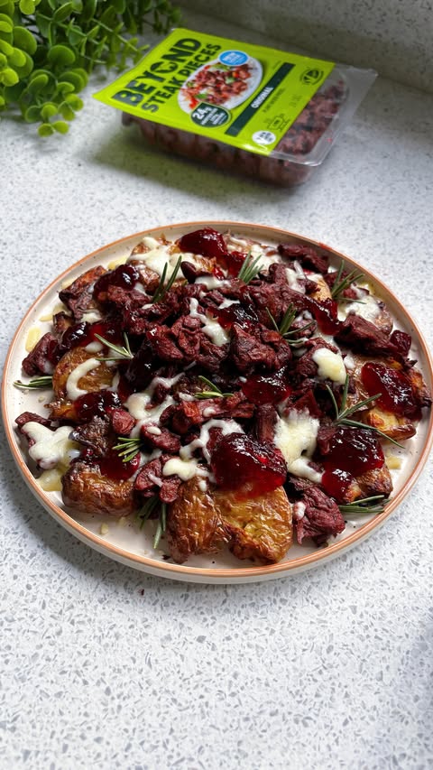 Instagram post by @veryhungrygreek for Beyond Meat. Caption reads: [...] this is a plant-based BANGER 👏

@beyondmeat....