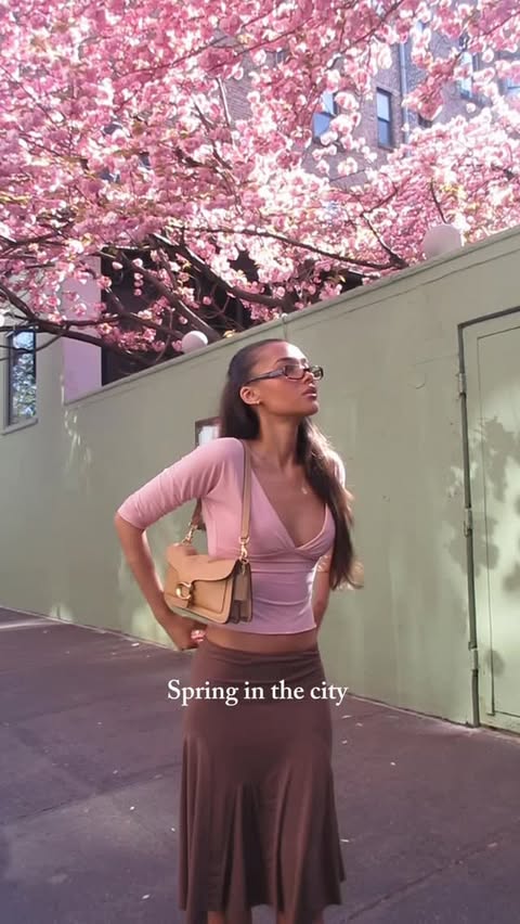 Instagram post by @amayaancr for Coach. Caption reads: A new season in my favorite city with @coach ✨....