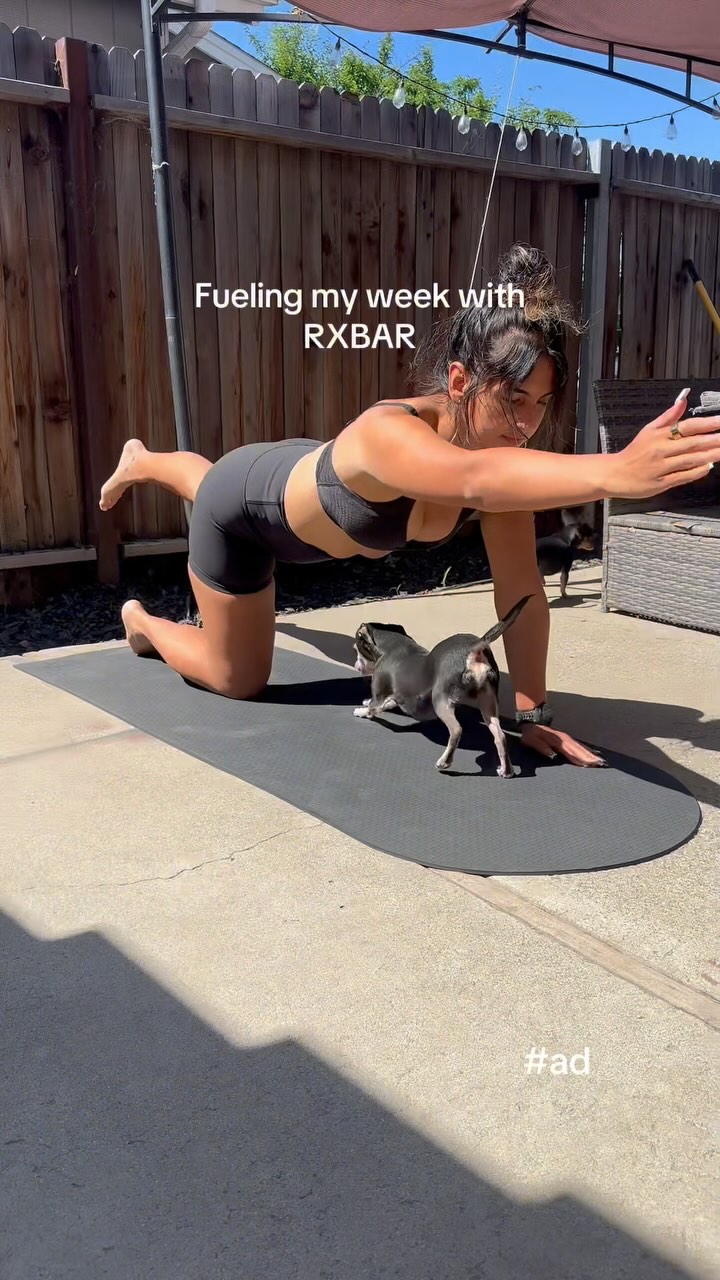 Instagram post by @gisss.ellle for RXBAR. Caption reads: #rxbarpartner Running on ambition, vibes, and....