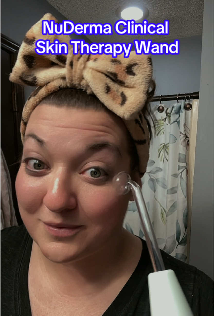 TikTok post by @imchristywatts for Pure Daily Care NuDerma Wand. Caption reads: [...] #skincare #facial #antiaging @Pure Daily....