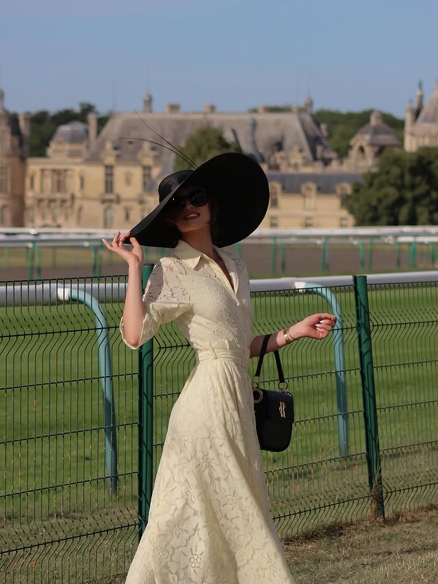 Instagram post by @minakshi.mahta for Longines. Caption reads: [...] French elegance 💛 at Prix de Diane....