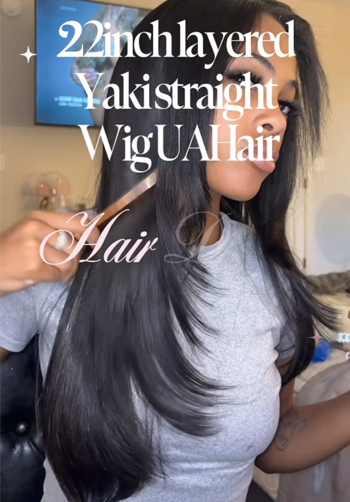 TikTok post by @luvinkiaraaa for U&A Hair Shop. Caption reads: 22 inch @U&A HAIR SHOP Layered v-part wig. #wigtok....