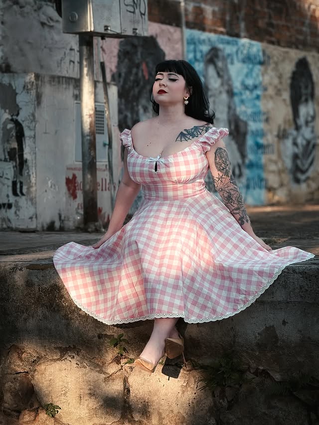 Instagram post by @astralromannce for Hell Bunny. Caption reads: in my soft era 💖✨ . . Dress by @hellbunnyofficial....