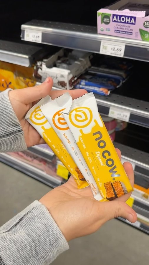 Instagram post by @miss_meatless_muscle for No Cow. Caption reads: @wholefoods has my favorite vegan protein bars 2....