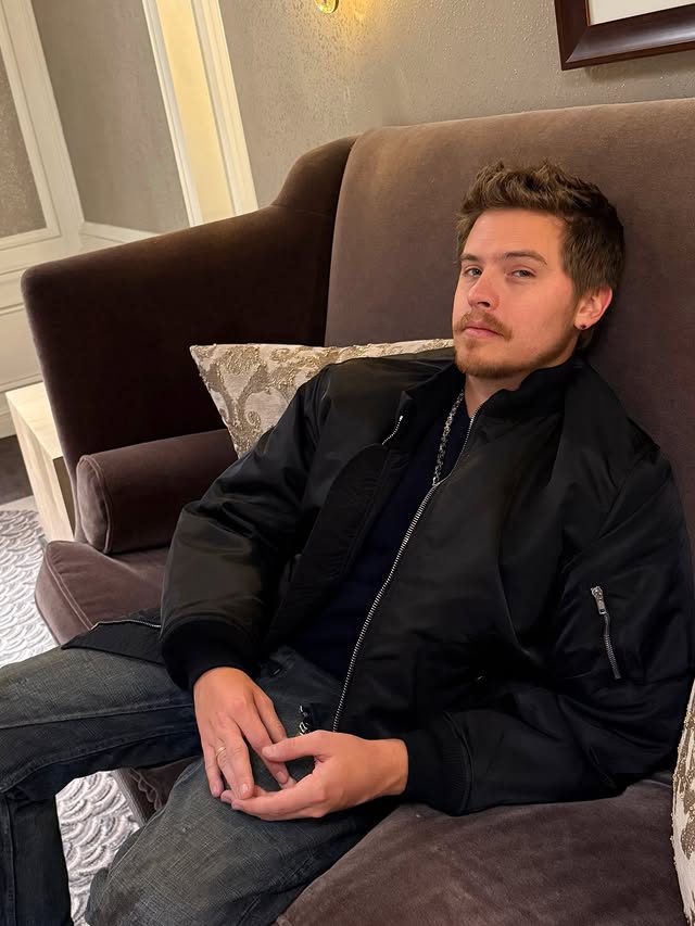 Instagram post by @dylansprouse for FWRD. Caption reads: [...] book. Thanks for having me @revolve and....