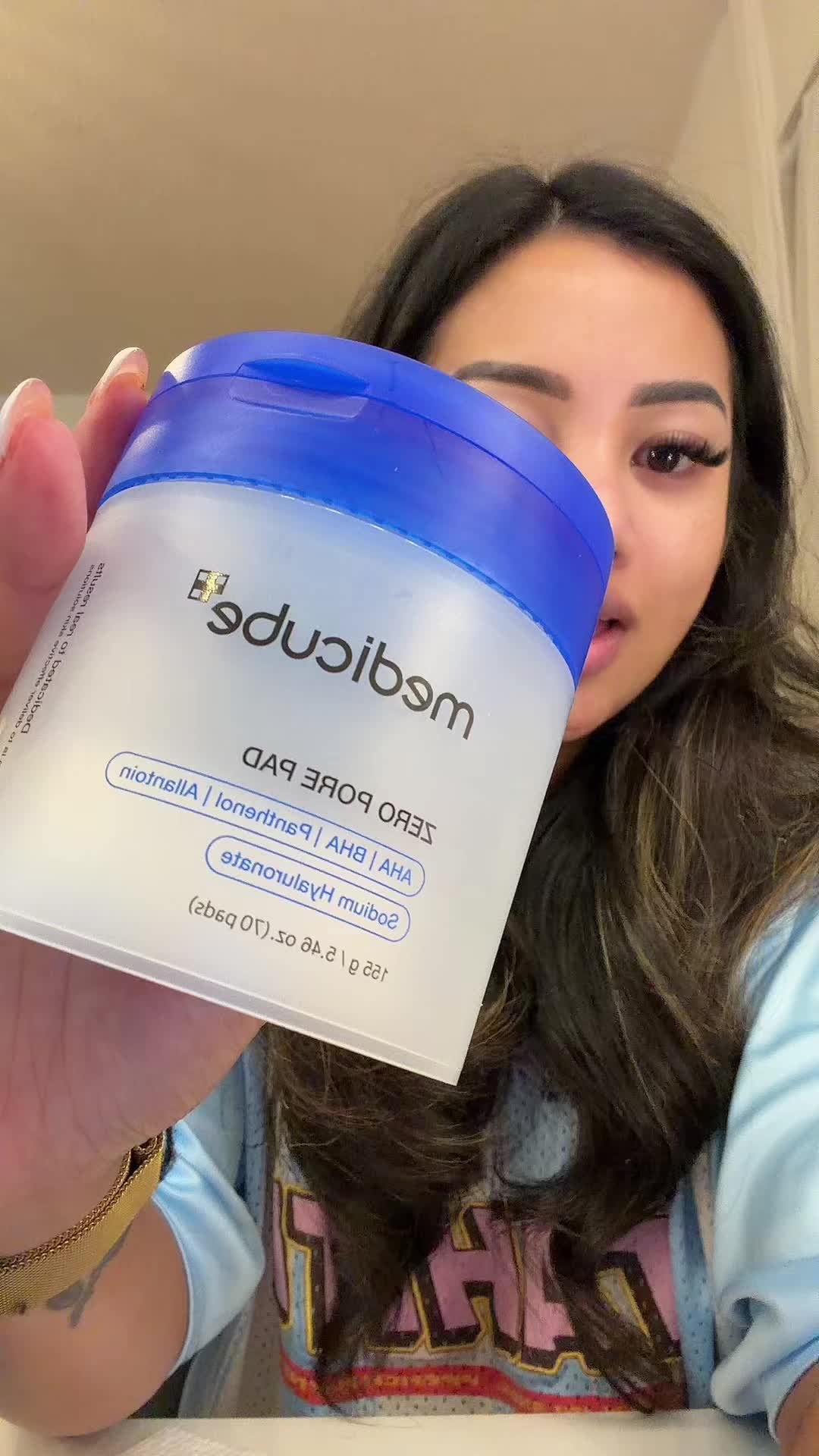 TikTok post by @louaira for Medicube. Caption reads: @medicube UK zero pore pads #medicube #mollymae....