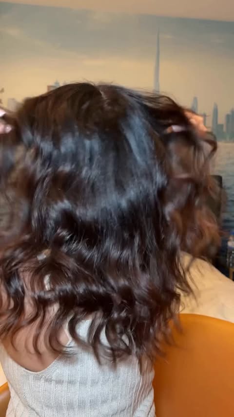 Instagram post by @beaussima for OUAI. Caption reads: Nothing makes me happier than an everything hair....