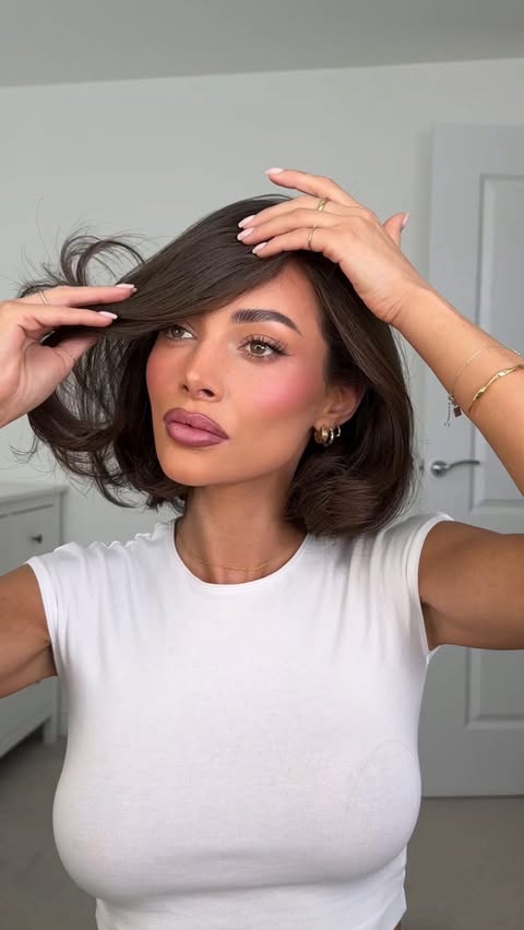 Instagram post by @lydiafowler for Beauty Works Hair Extensions. Caption reads: AD my at home big bouncy blowout routine using the....