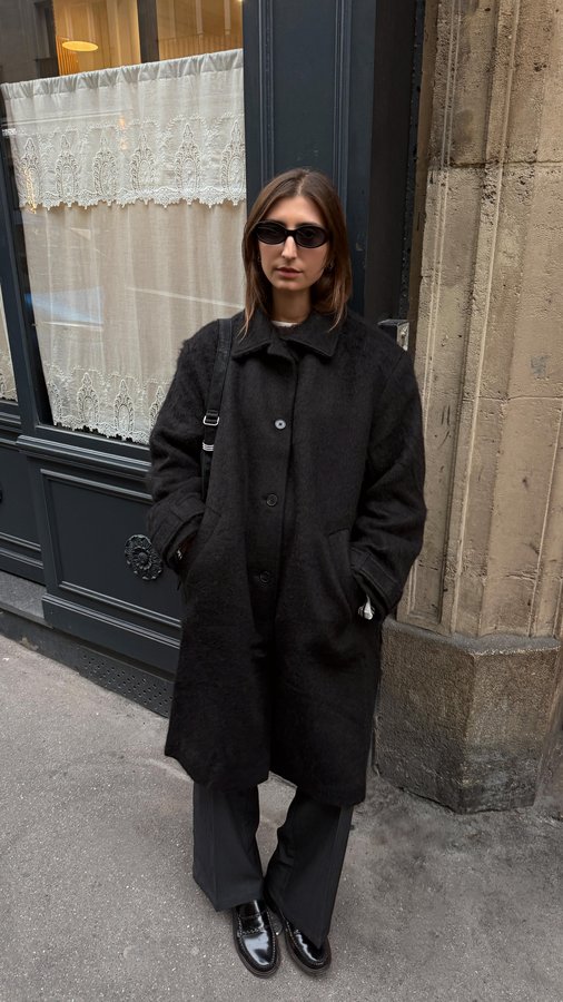 Instagram post by @poppyalmond for WEEKDAY. Caption reads: in love with Paris and our matching outfits #monki....