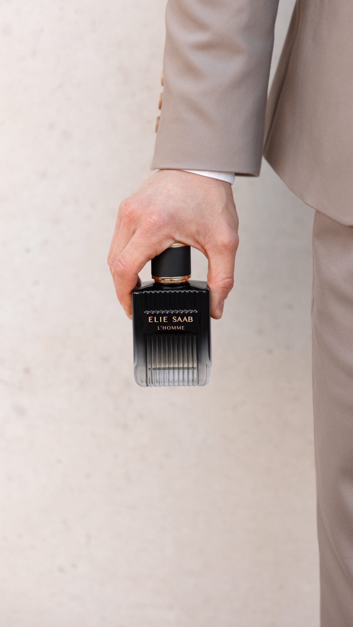 Instagram post by @robo_13 for ELIE SAAB. Caption reads: [...] – the new L’HOMME Eau de Parfum by....