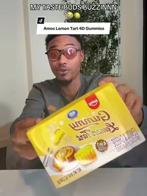 TikTok post by @shopdealsbyquis for Amos Sweets. Caption reads: @Amos Sweets Did Their Thing With These New Lemon....