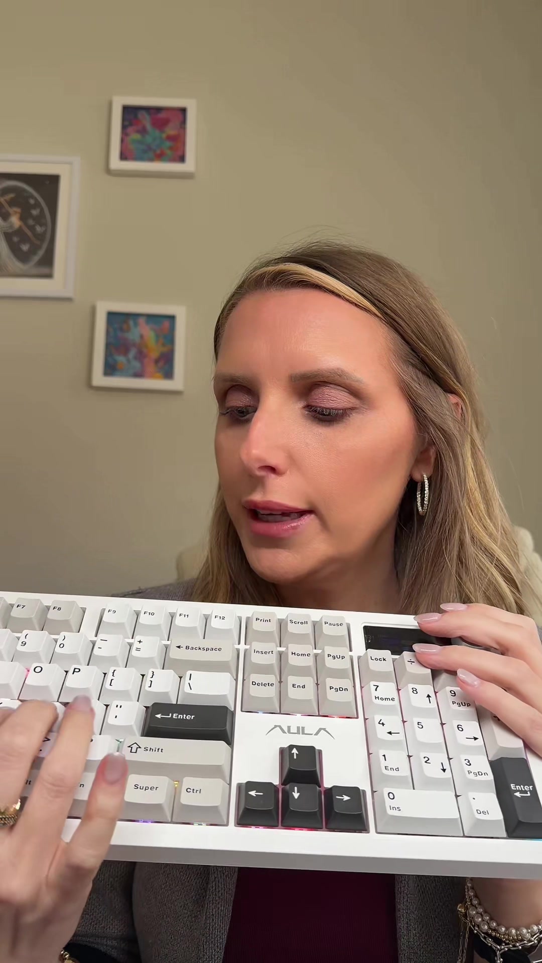 TikTok post by @itssabrinahere for Aula. Caption reads: Get your @Aula F106 PRO Keyboard now! #keyboard....