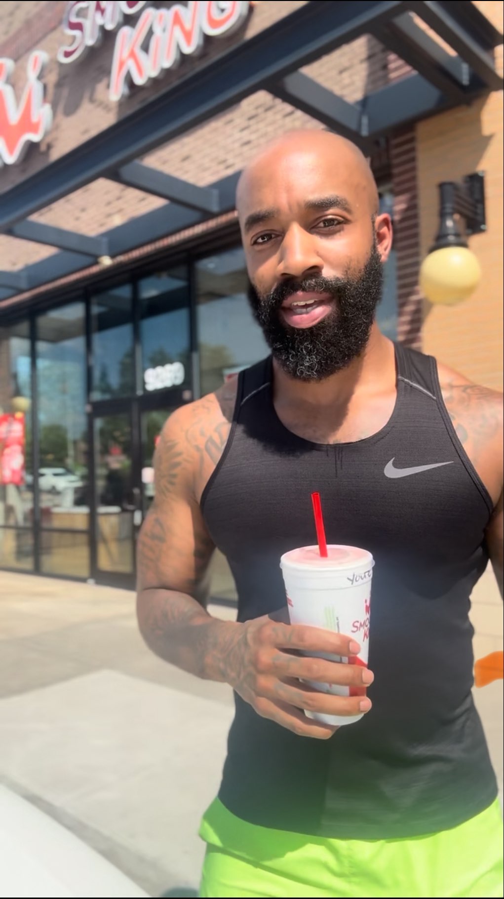 Instagram post by @mrtntfit for Smoothie King. Caption reads: Before or after my workout? I’m reaching for the....