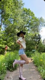 Instagram post by @bashdesignsco for Corral Boots. Caption reads: [...] 
• shorts: @aeropostale 
• boots:....