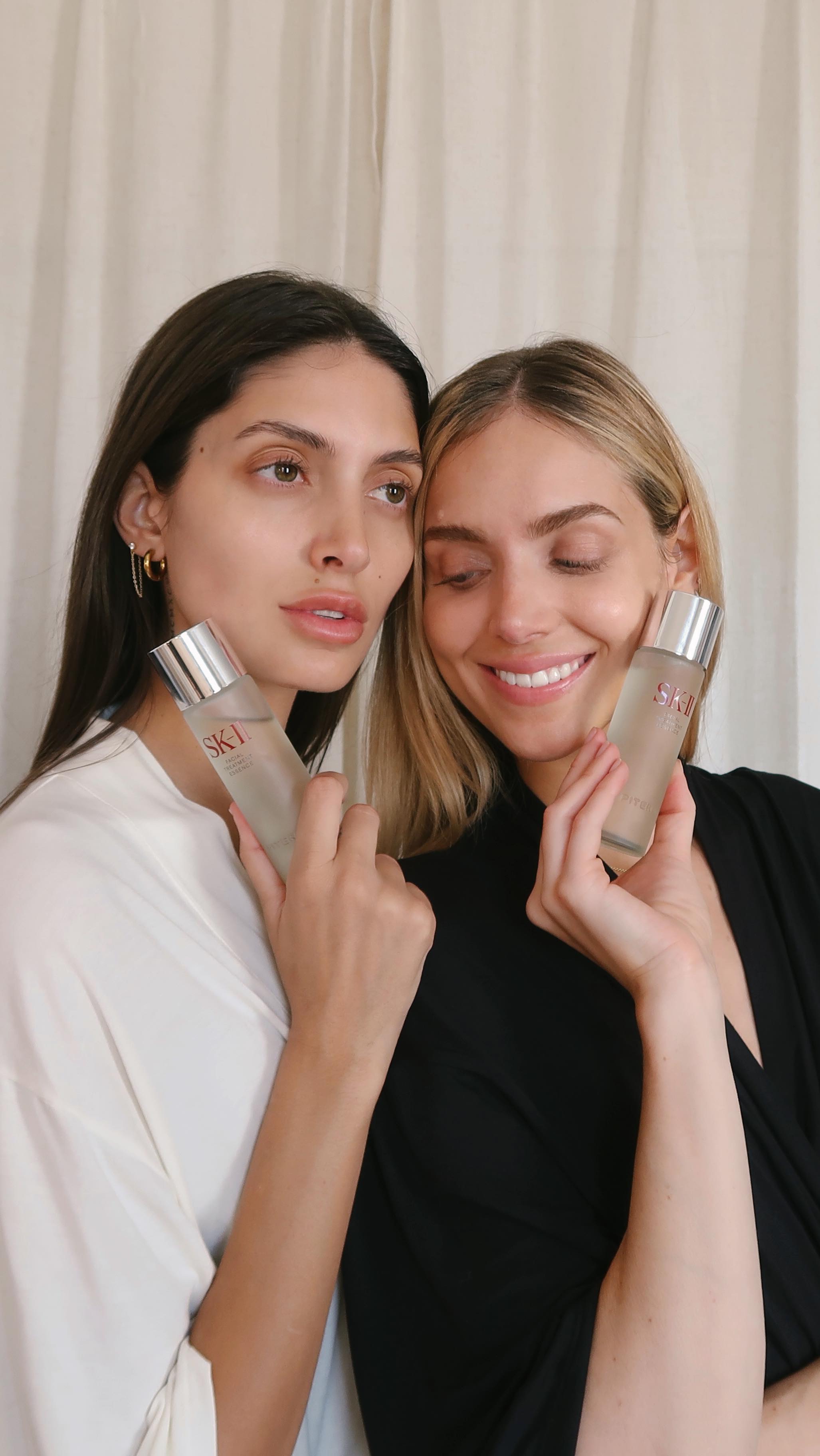 Instagram post by @laraghraoui for SK-II. Caption reads: #ad #skiipartner She steals my hoodies and I steal....