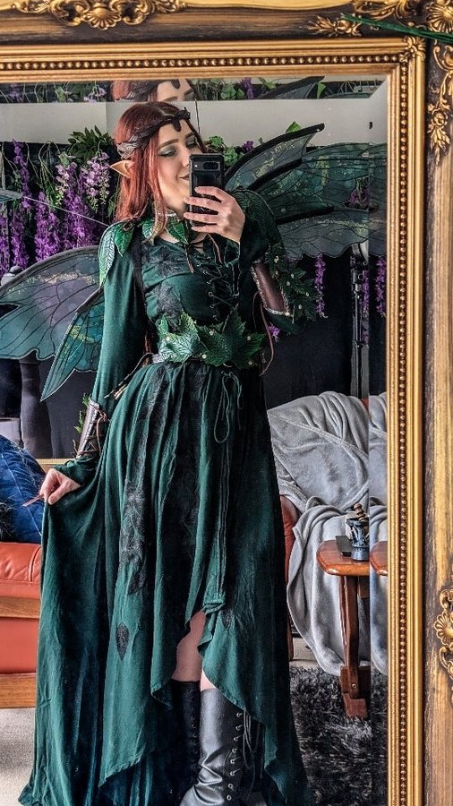 Instagram post by @thescarletthuntress for HolyClothing. Caption reads: Dress like a fantasy fairy 🧚‍♂️

Leather leafy....