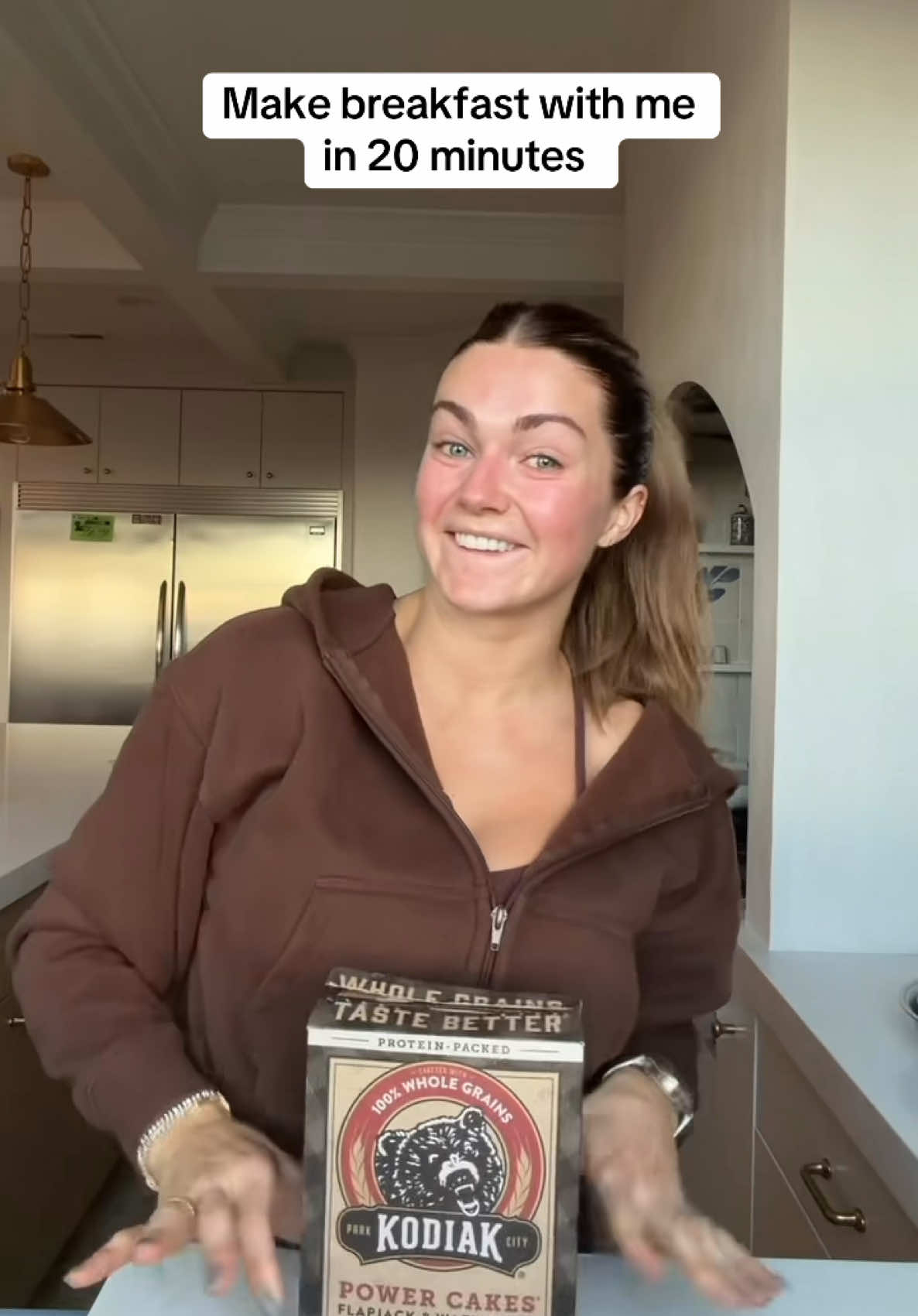 TikTok post by @lindsarnold for Kodiak Cakes. Caption reads: [...] of choice, sheet pan pancakes using....