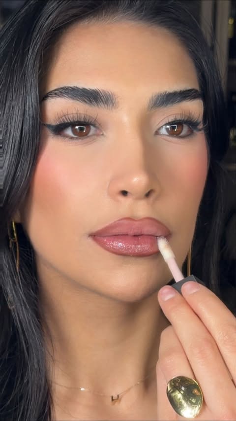 Instagram post by @honasbarz for Max Factor. Caption reads: ‘tis the season for glittery eyes and glazed lips....