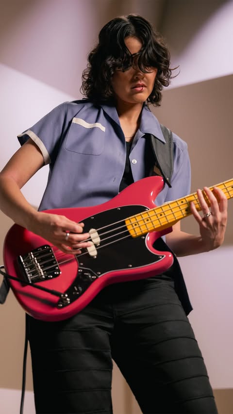 Instagram post by @camillabasskilla for Fender. Caption reads: Meet the American Professional Classic Mustang....