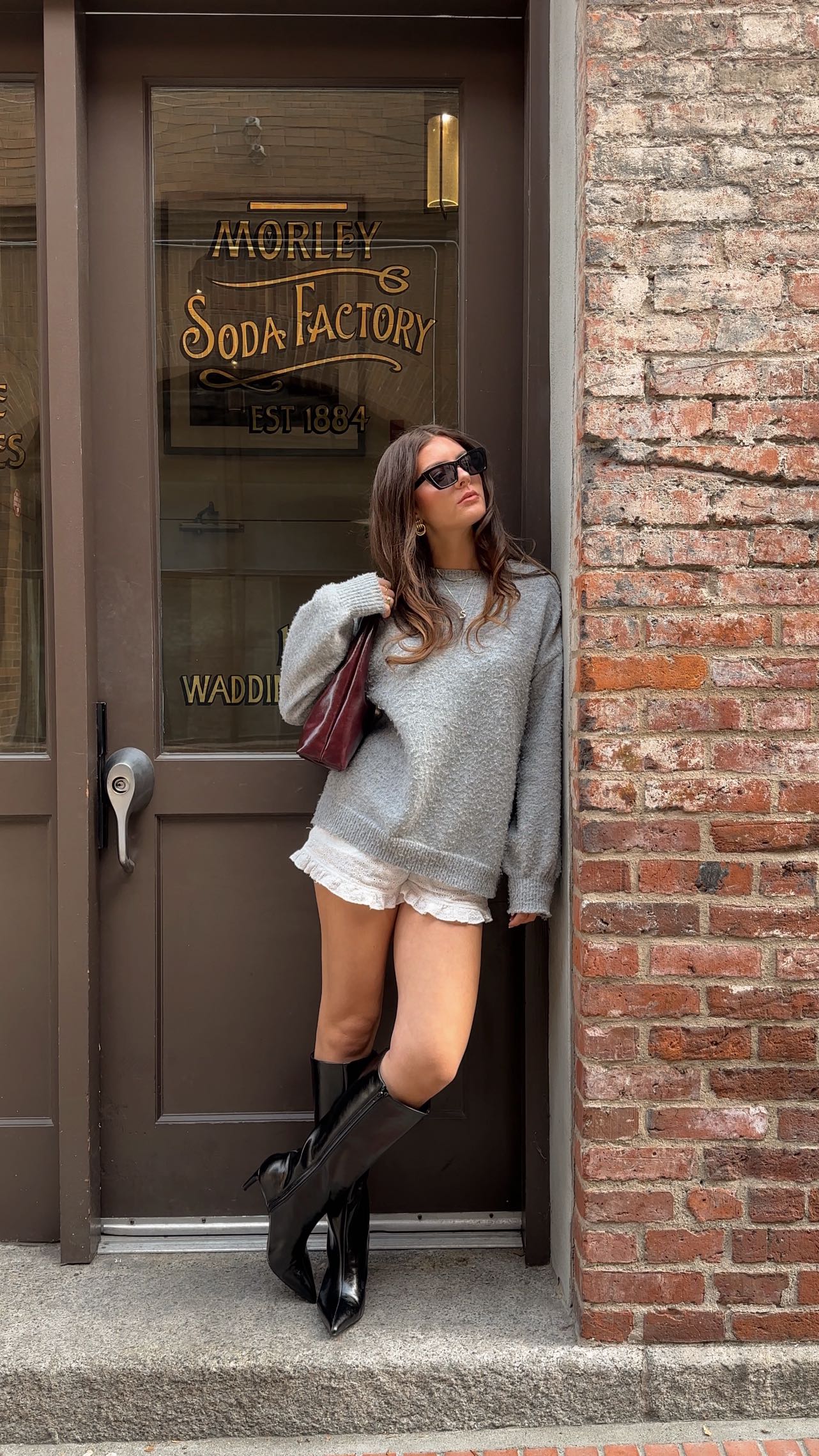 Instagram post by @sophia.berk for callitspring. Caption reads: The perfect fall accessories @callitspring 🥀🖤🍂....