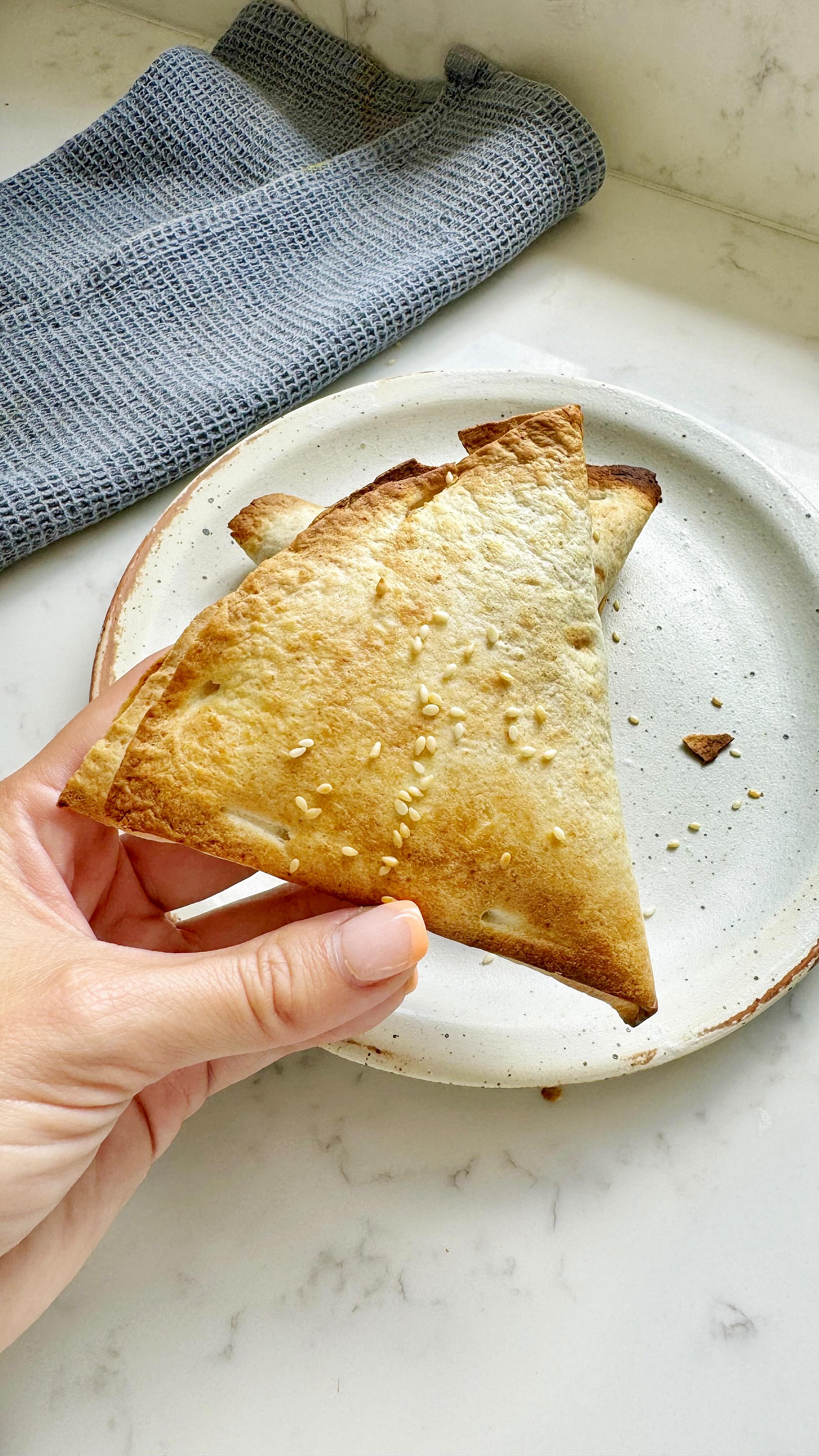 Instagram post by @alexarciab for Degusta Box. Caption reads: TUNA MELT HOT POCKETS 

✅ High Protein ✅ Easy to....