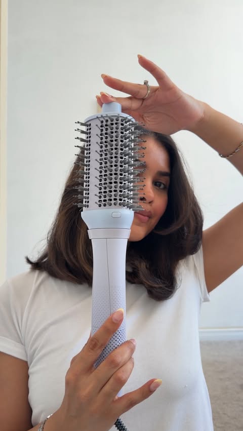Instagram post by @withlovemansayy for Revlon Hair Tools. Caption reads: [...] Meet your new fav hair tool 🙌 The....