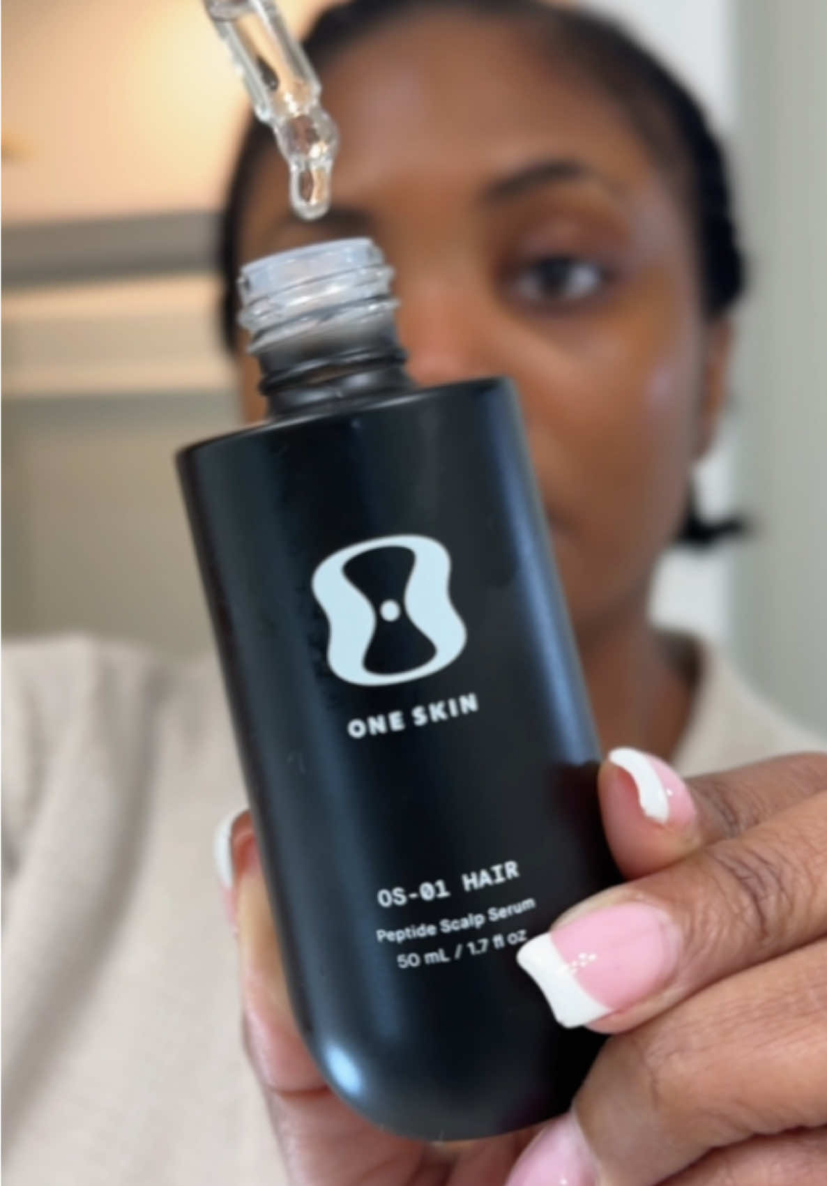 TikTok post by @torilatise for OneSkin. Caption reads: [...] within the new couple of months.  #oneskin....