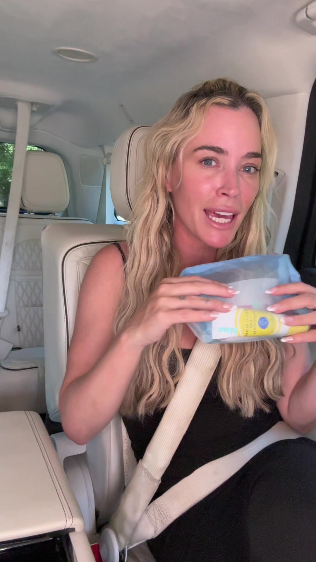 TikTok post by @teddimellencamp for Bliss World. Caption reads: [...] riding in the backseat.  And with my @Bliss....