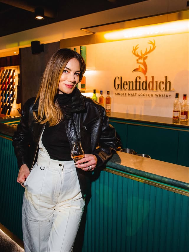 Instagram post by @michellemonaghan for Glenfiddich. Caption reads: [...] at the Las Vegas Grand Prix thanks to....