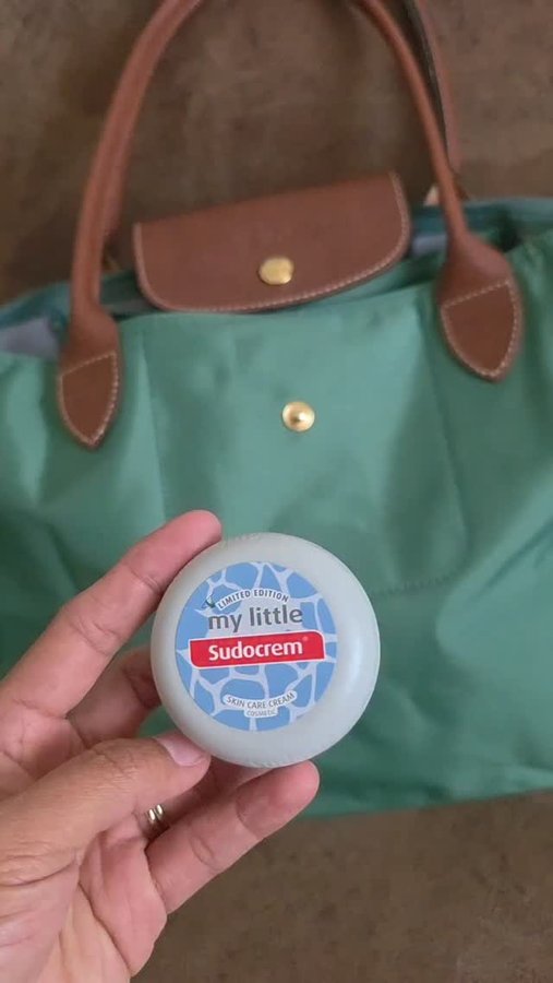 Instagram post by @tomi_nico24 for Parents. Caption reads: Pocket-sized perfection! 🩷 My 22g @sudocrem goes....