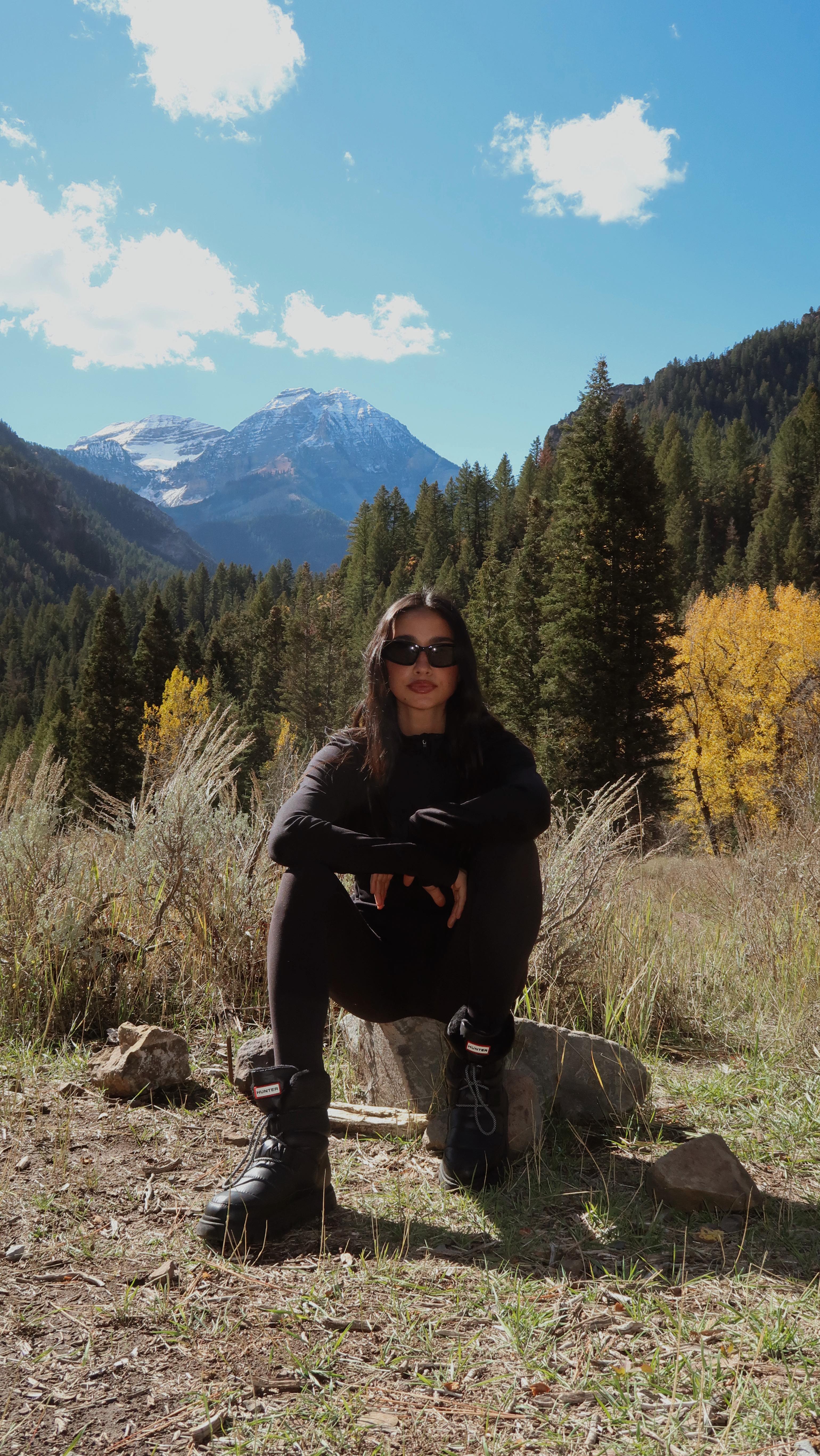 Instagram post by @himichellewhite for Hunter Boots. Caption reads: [...] calling for something warmer. @hunterboots....