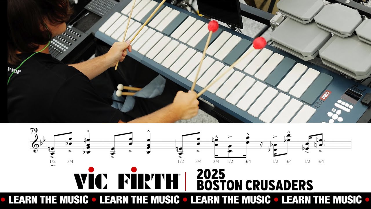 YouTube post by @vicfirthmarching for Vic Firth. Caption reads: Vic Firth takes you BEYOND THE LOT with the 2025....