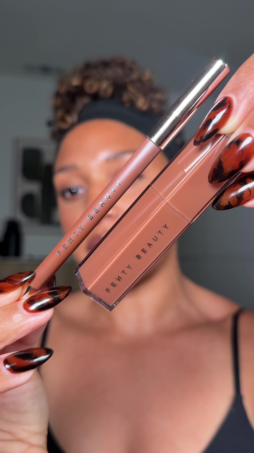 TikTok post by @leigha_chrstine for Fenty Beauty. Caption reads: [...] brown lip this much!! @Fenty Beauty....