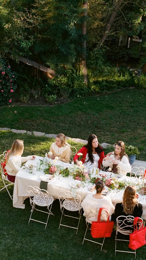 Instagram post by @amelia.edmondson for CALPAK. Caption reads: Garden party to celebrate the launch of @calpak’s....